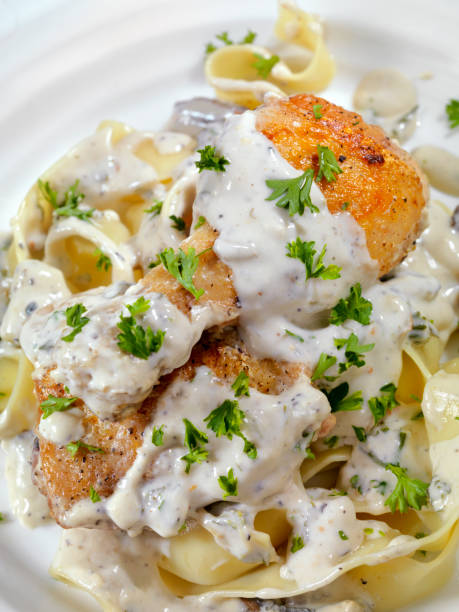 CHICKEN ALFREDO ROLLER UPS